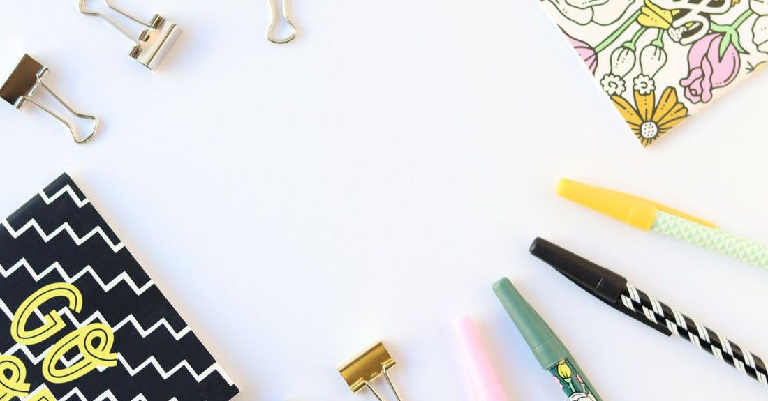 How to apply eyeliner for hooded eyes using a precision eyeliner pen and stamp tool on a white background flatlay