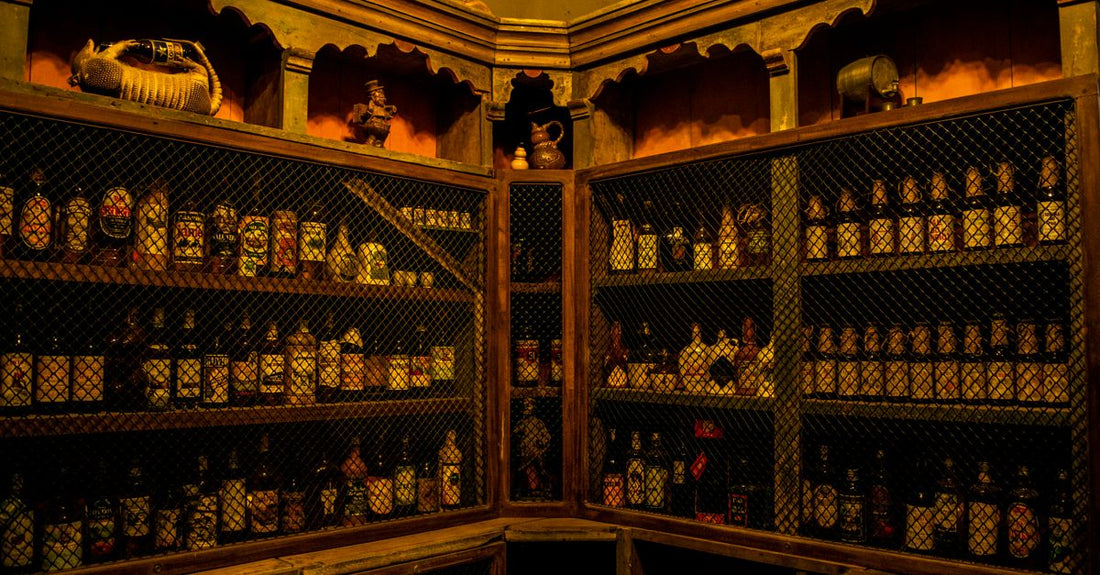 A row of cologne bottles on a shelf, illustrating a cologne buying guide for UK shoppers.