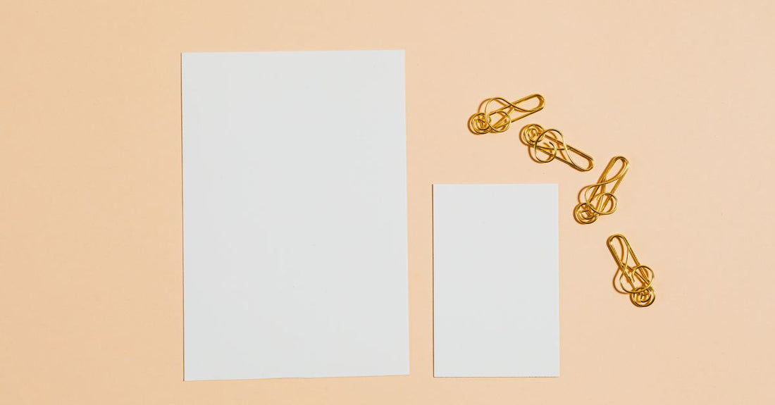 A flatlay of various hair clips including duckbill, claw, and barrette styles, illustrating how to choose clips for damage-free styling.