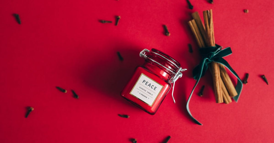 A flatlay of hair mask jars and tubes on a shelf, illustrating a hair masks buying guide UK