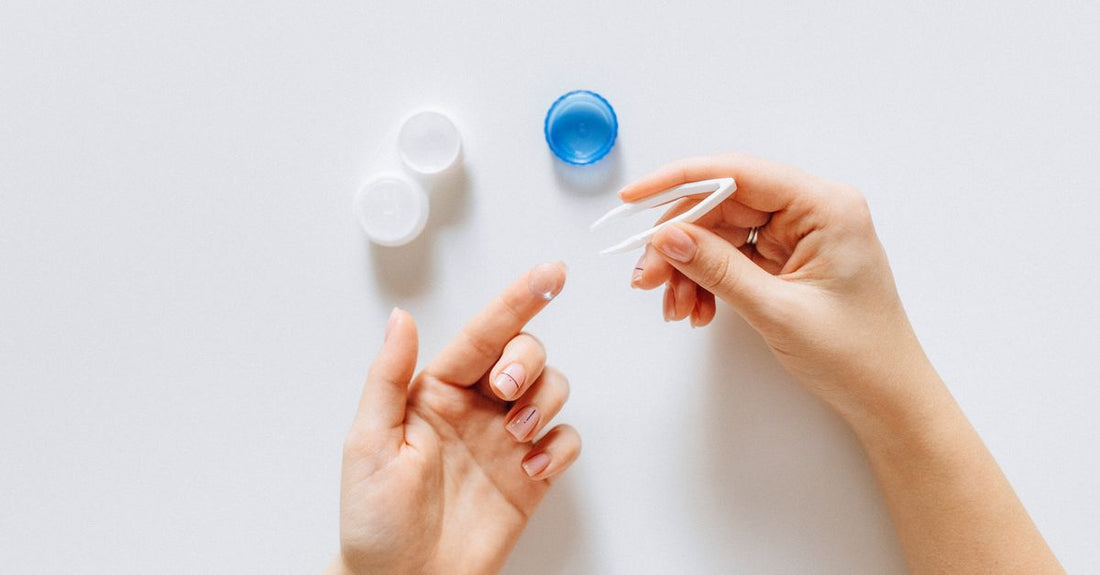 Eye care buying guide featuring a premium eye serum bottle on a marble surface with soft natural lighting.