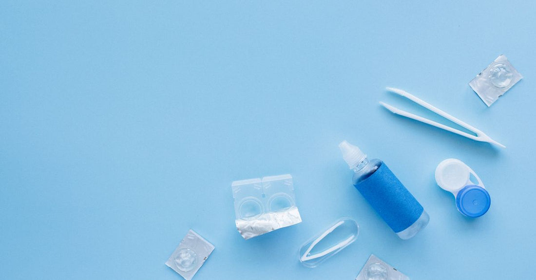 A selection of the best adhesives UK 2026 displayed on a clean surface, including wig, nail, and skincare adhesives.