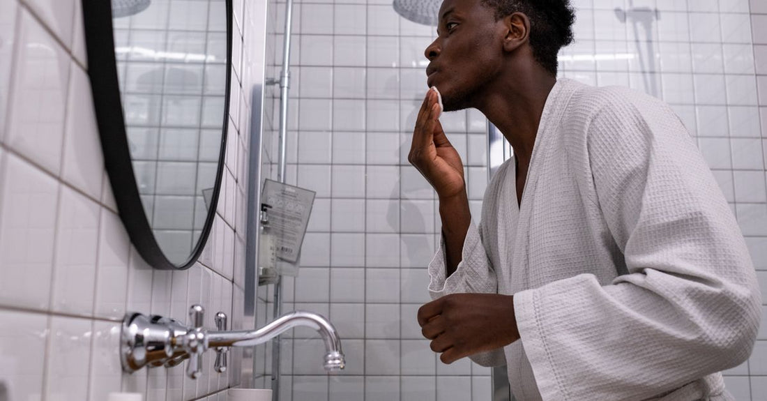 Where to buy men's online: Avelisse men's grooming essentials arranged on a clean surface.