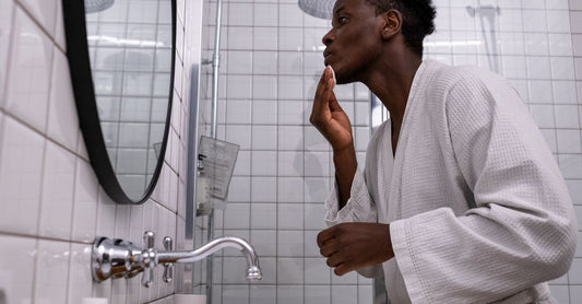 Where to buy men's online: Avelisse men's grooming essentials arranged on a clean surface.
