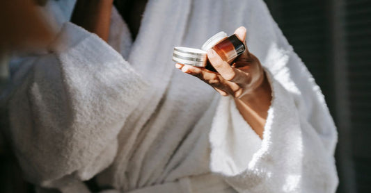 White jar of the best moisturiser for acne-prone skin UK on a clean surface.