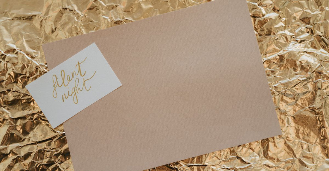 Professional hair foils and a silicone highlighting cap arranged on a white surface, representing the best caps, foils & wraps 2026.