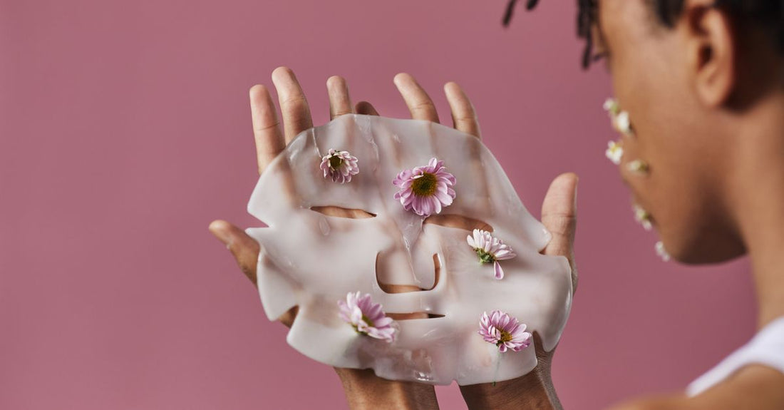 A flatlay of five different face masks arranged on a white background, part of a masks buying guide for UK skin types.