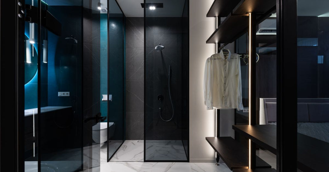 Four best body washes 2026 bottles lined up on a marble surface, one with a tester's hand reaching for the most hydrating formula.