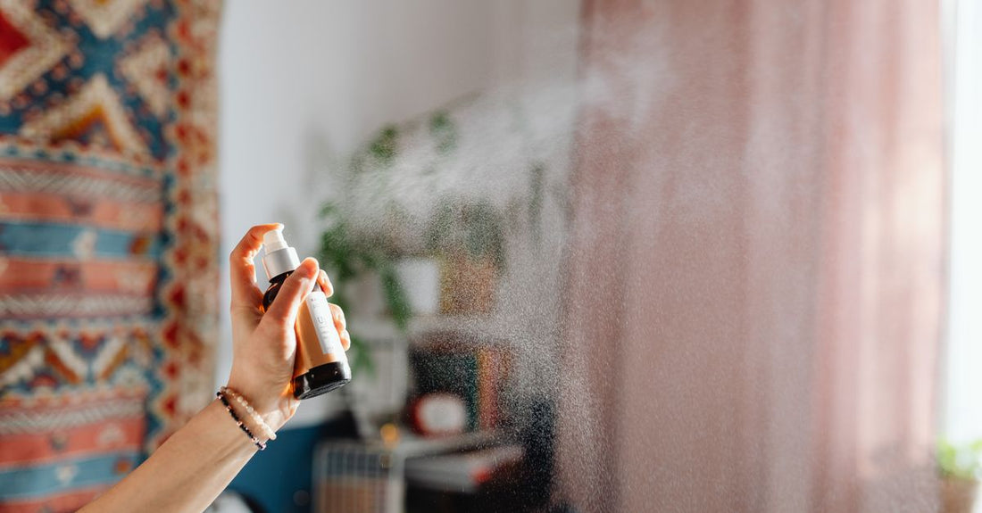 Body spray bottle on a dark shelf, illustrating how to use body spray as cologne for lasting scent.