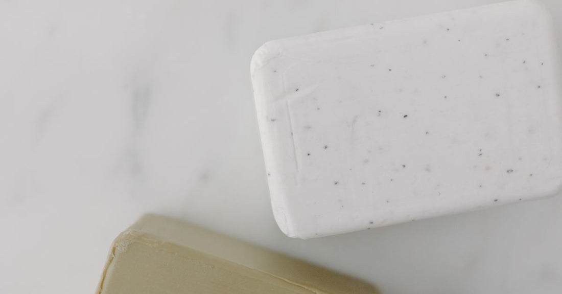 A selection of artisan soap bars on a neutral background, illustrating how to choose soaps UK