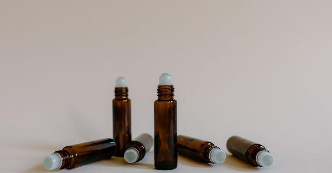 A selection of antiperspirant roll-ons and sticks on a white background, illustrating an antiperspirants buying guide for UK shoppers.