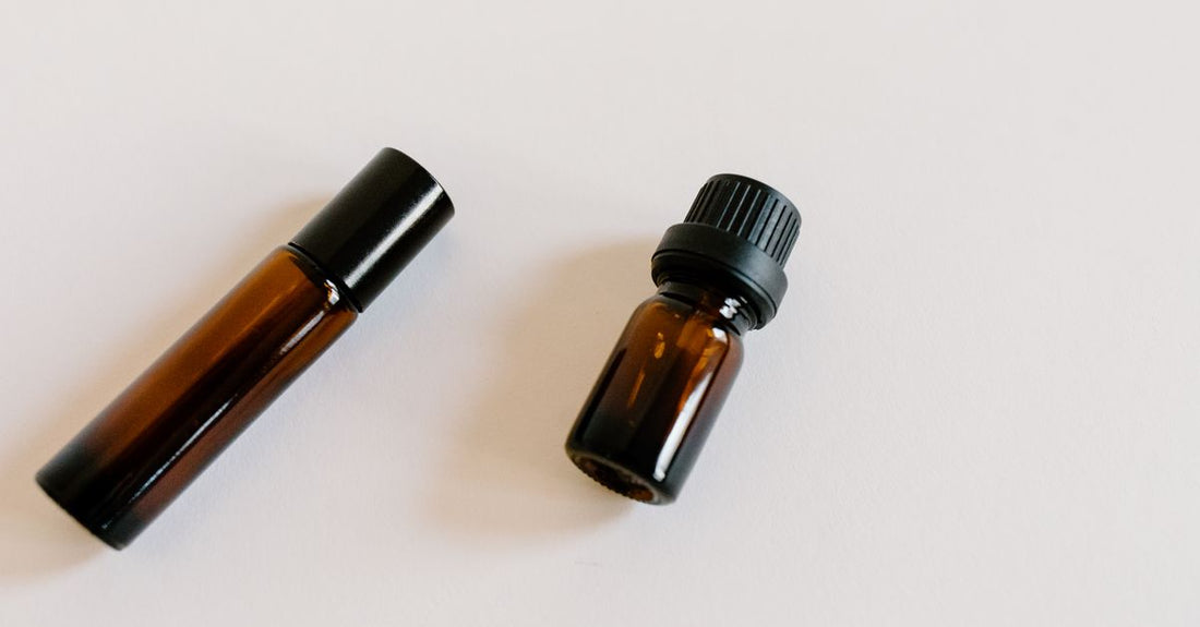 A selection of creams and lotions in jars and bottles on a light surface, illustrating a creams & lotions buying guide for beginners.