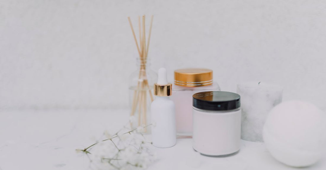 A selection of night cream jars on a marble surface, illustrating how to choose night creams UK for different skin types.