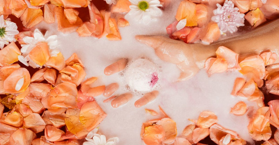 How to make a bubble bath at home using simple ingredients like liquid castile soap and glycerine, displayed on a bathroom shelf.