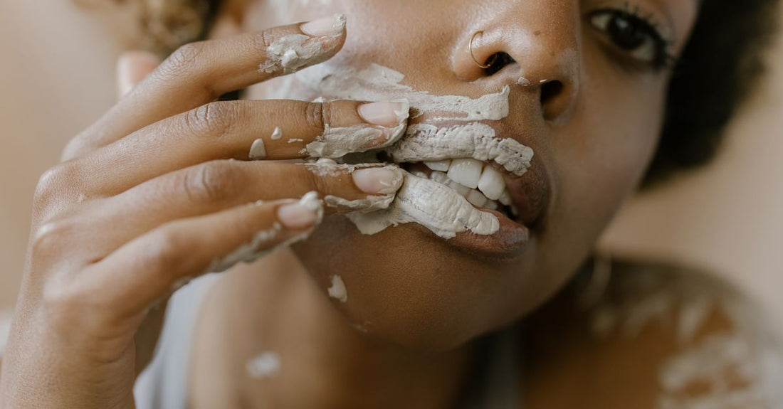 A selection of clay and sheet face masks on a light summer background, illustrating how to choose masks for different skin types.