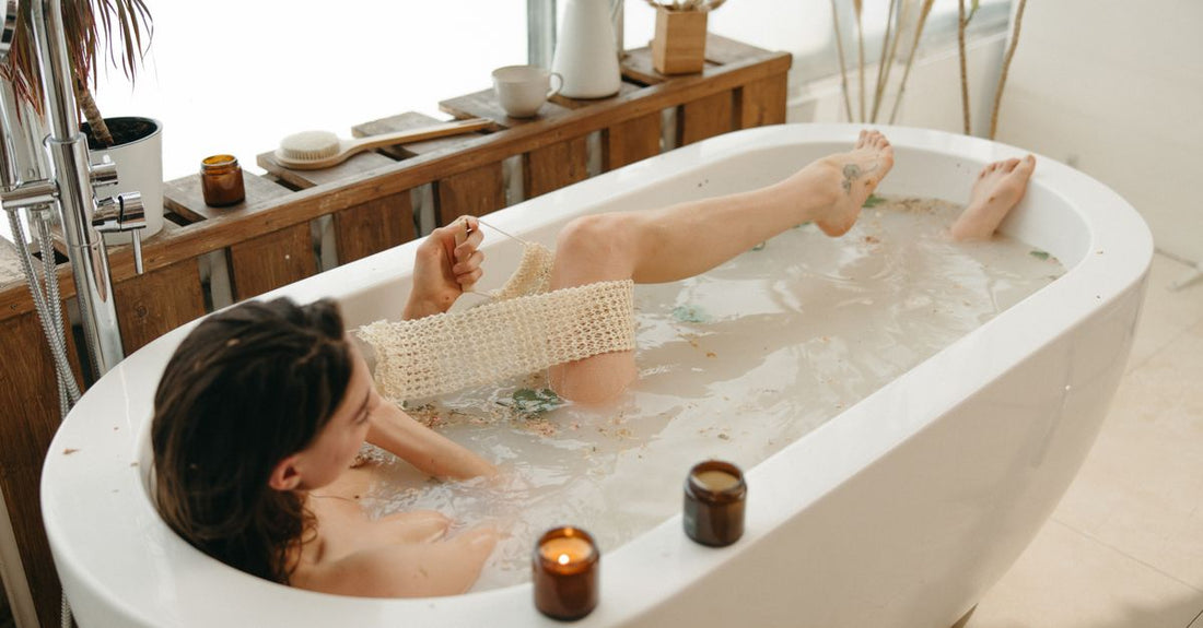 Bubble bath buying guide UK: an array of bubble bath bottles on a bathroom shelf, from budget to luxury.