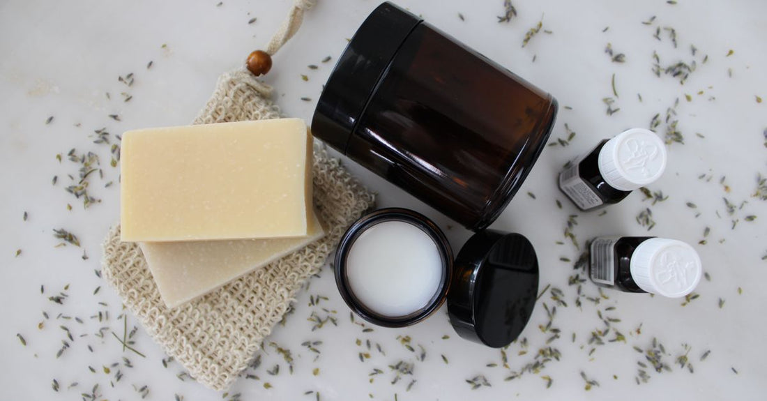 A collection of balms and moisturisers arranged on a marble surface, representing a complete skincare routine for UK shoppers.