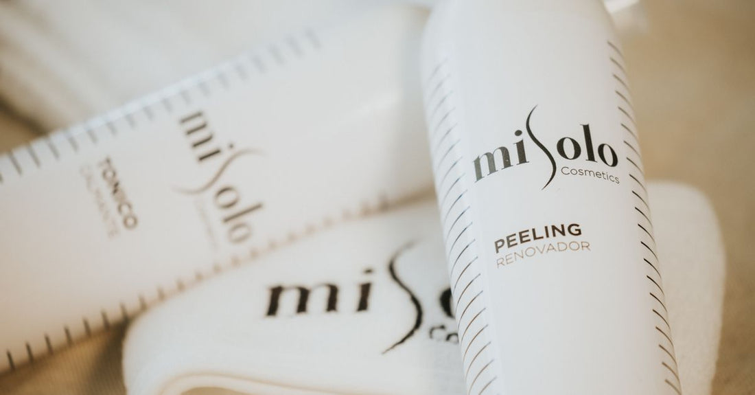 A curated flatlay of best cleansers UK 2026 on a marble surface, featuring gel, cream and oil textures in elegant packaging.