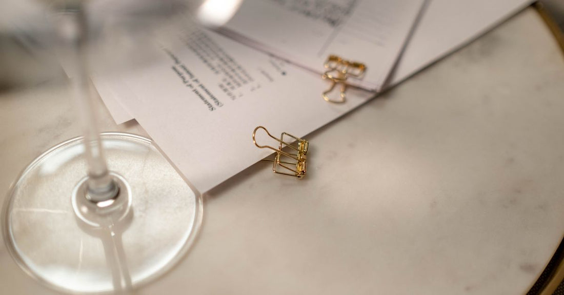 Four damage‑free hair clips laid out on a marble surface, demonstrating how to choose clips for healthy hair.