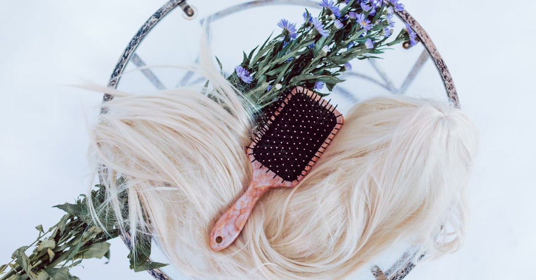 Flatlay of a high-quality synthetic wig with lace front cap construction, illustrating a wigs buying guide UK article.