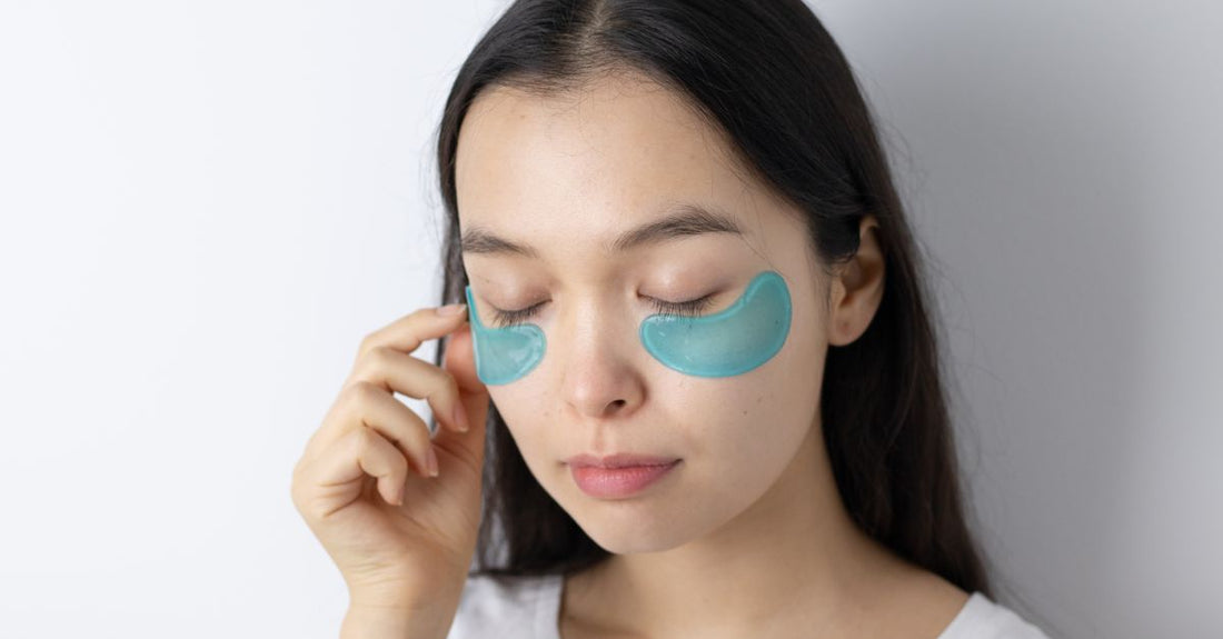 Jar of Korean hydrogel eye patches for wrinkles displayed on a white bathroom shelf in the UK.