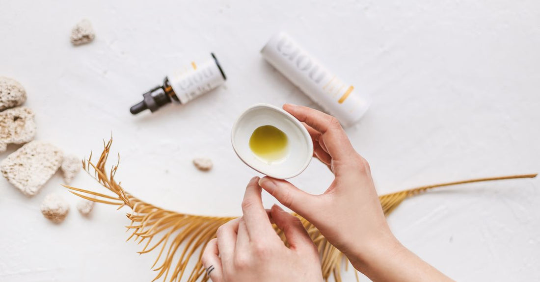 A collection of skincare balm jars on a white background, featuring the best balms 2026 for skin barrier repair.
