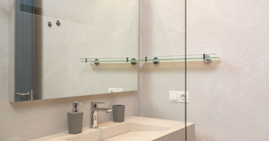 A collection of body wash bottles on a bathroom shelf, illustrating the body washes buying guide for gifting.