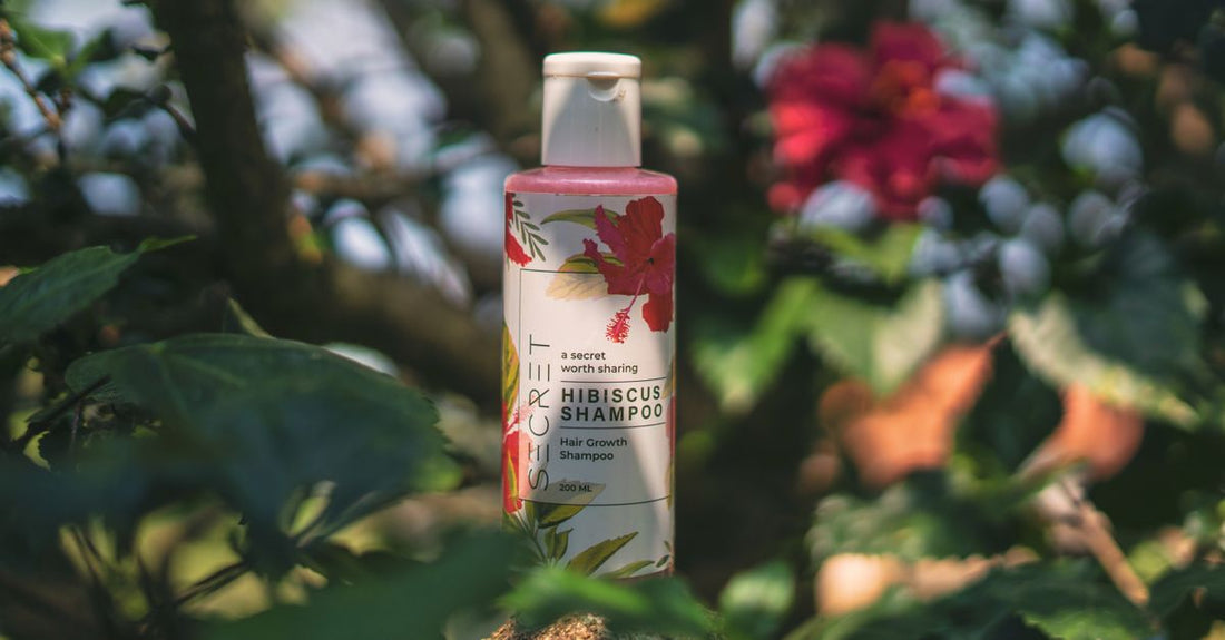 A bottle of the best scalp shampoo for dandruff on a bathroom shelf, promising relief from flakes and itch.