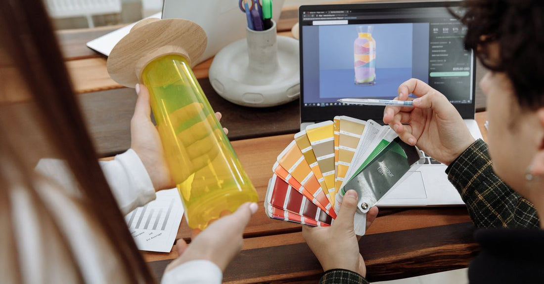 A fan of hair colour swatches showing various shades of blonde, brown, and red for the best hair color 2026.
