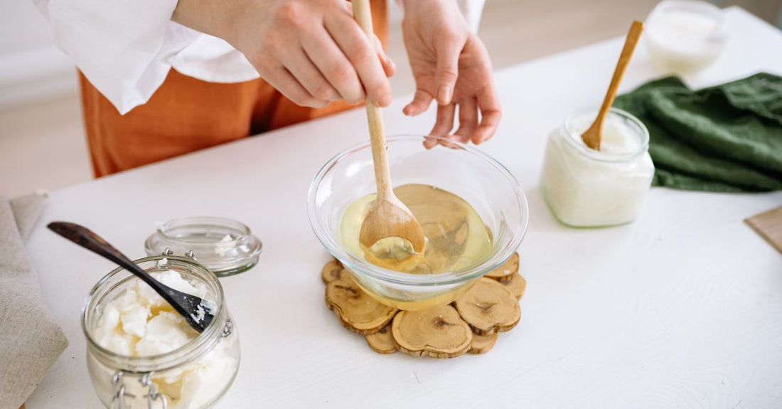 A selection of moisturiser jars with natural ingredients, illustrating a creams buying guide for long-term skin health.