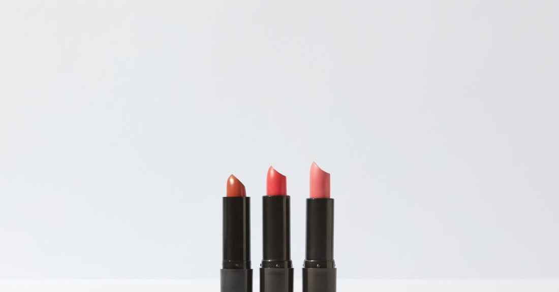 A selection of balms and moisturisers arranged on a light surface, illustrating a balms & moisturisers buying guide.