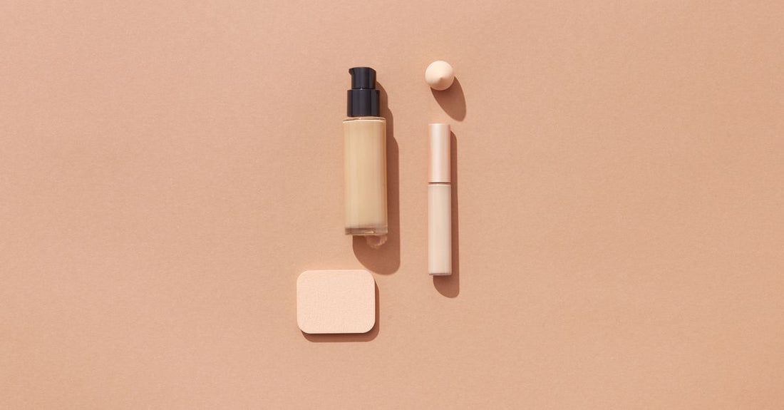 A selection of foundation primer bottles on a white surface, illustrating how to choose foundation primers UK.