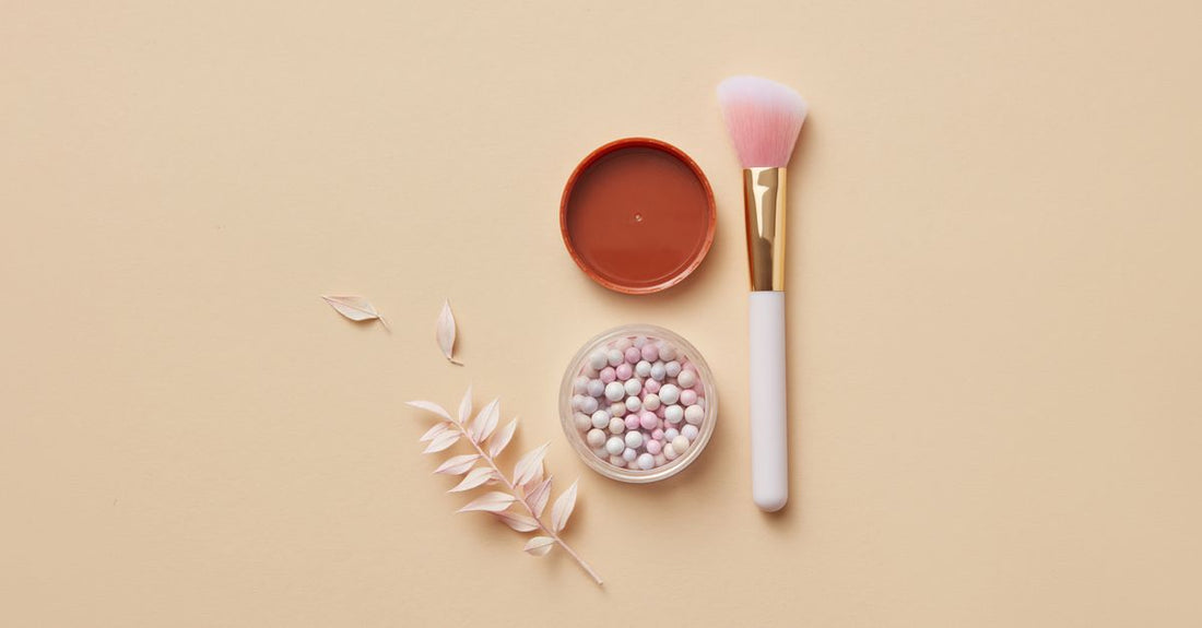A selection of the best makeup palettes UK 2026 displayed on a clean surface with brushes.