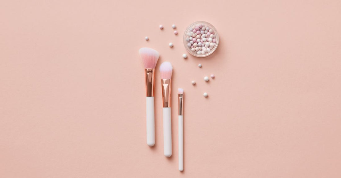 A flatlay of a beauty skincare kit with cleanser, serum and moisturiser on a white background, illustrating how to choose kits UK for value.