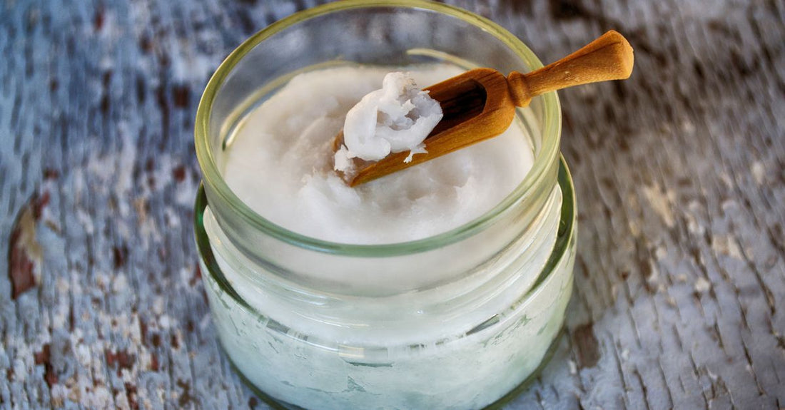 A jar of best body butters 2026 on a clean white background, showcasing its creamy, whipped texture.
