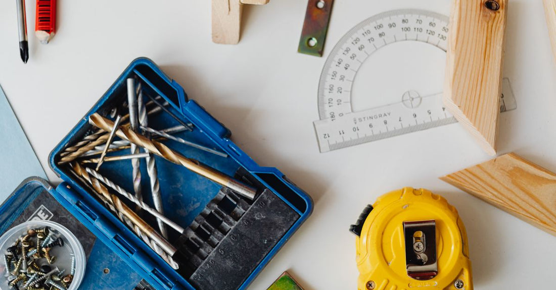Assorted nail drill bits displayed on a clean surface, illustrating where to buy nail drill bits online in the UK.