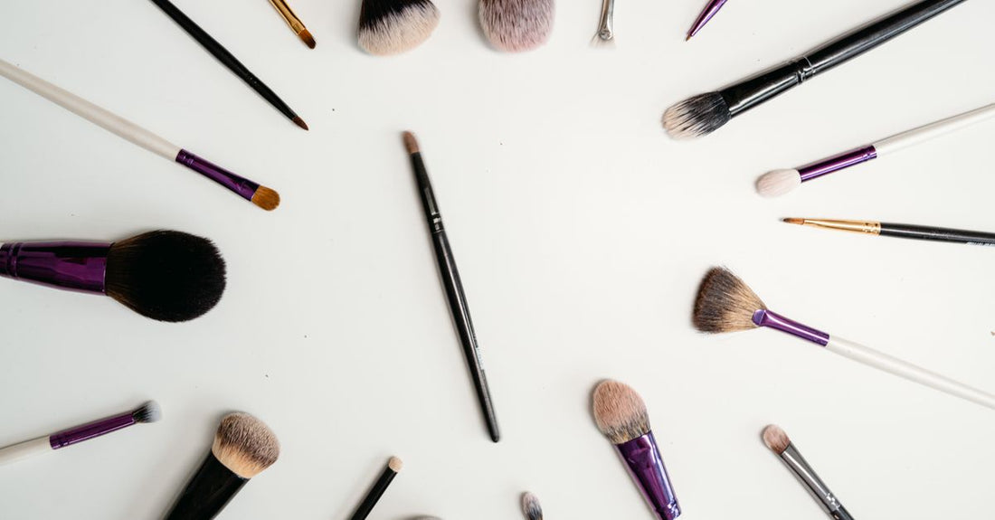 Two cream contour sticks on a clean white background, demonstrating how to use contour stick for sculpting.