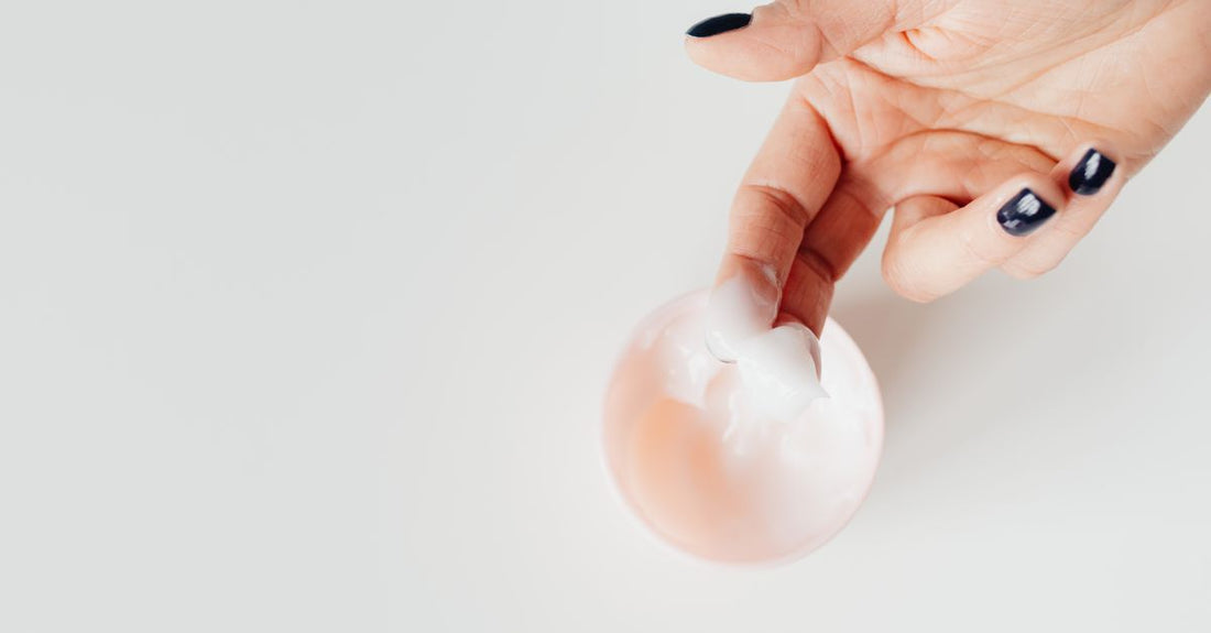An array of creams and lotions on a clean white surface, illustrating a creams & lotions buying guide UK.