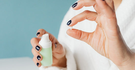 A flatlay of nail care products including strengthener, oil, and tools, illustrating how to choose nail care for a healthy routine.