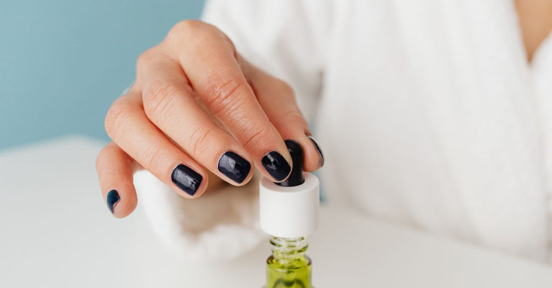 A row of nail base coat bottles on a white background, illustrating a base coat buying guide UK readers can trust.