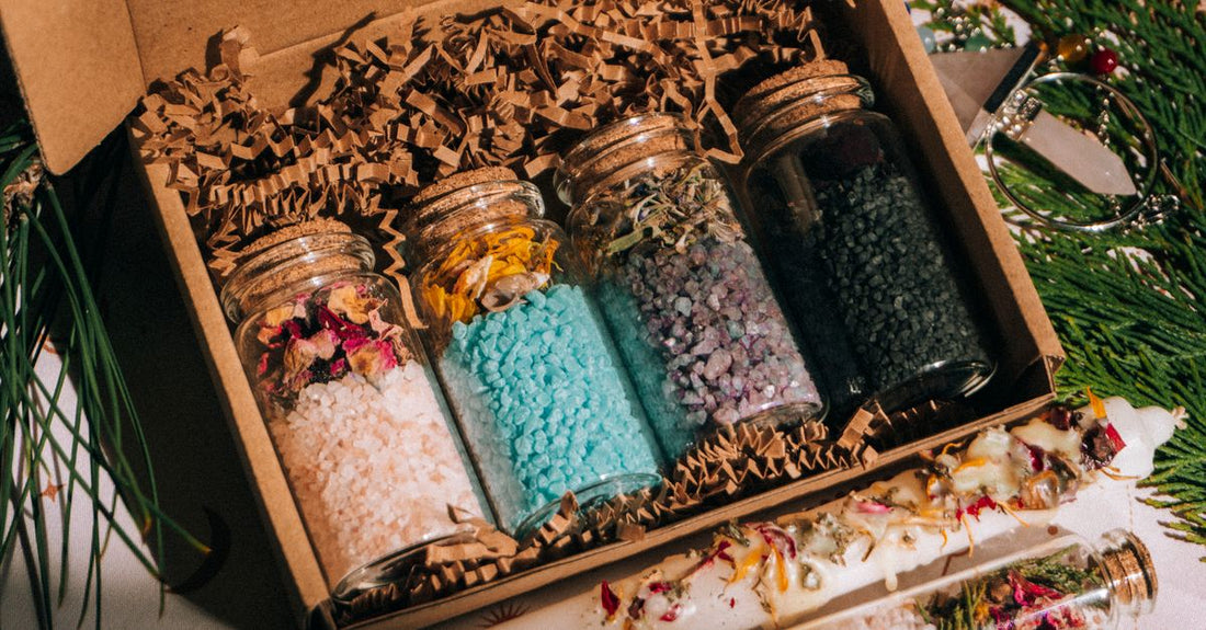 Assorted best bath & bathing accessories 2026 including bath salts, oils, and milk displayed on a bathroom shelf.