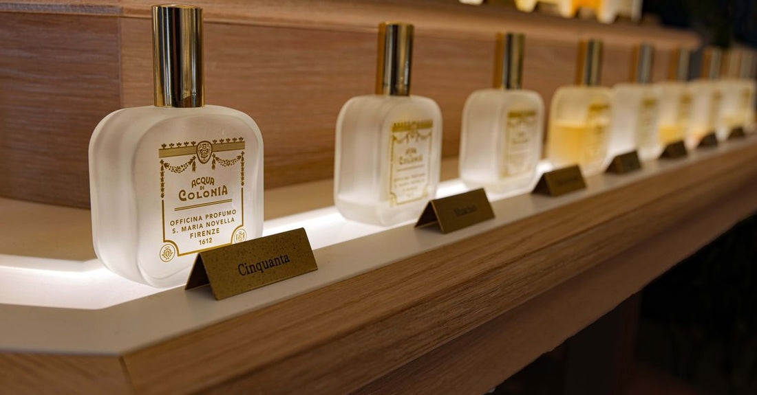 Display of various men's cologne bottles on a shelf, illustrating the best cologne for men UK value guide.