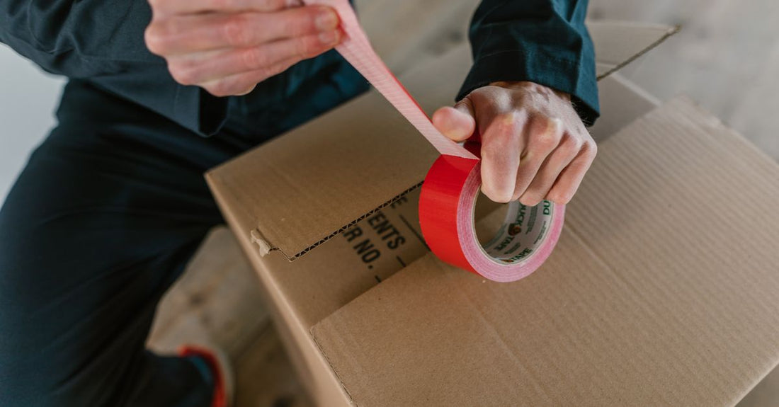 A roll of double-sided adhesive tape for hair extensions and wigs, a top pick among the best adhesives 2026.