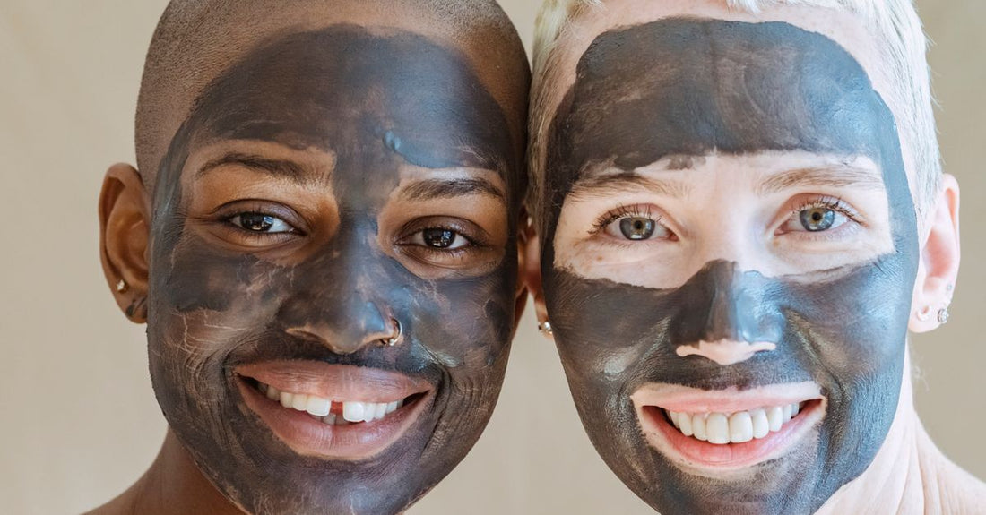 A flatlay of face mask products including sheet masks and clay masks on a neutral background, illustrating where to buy masks online.