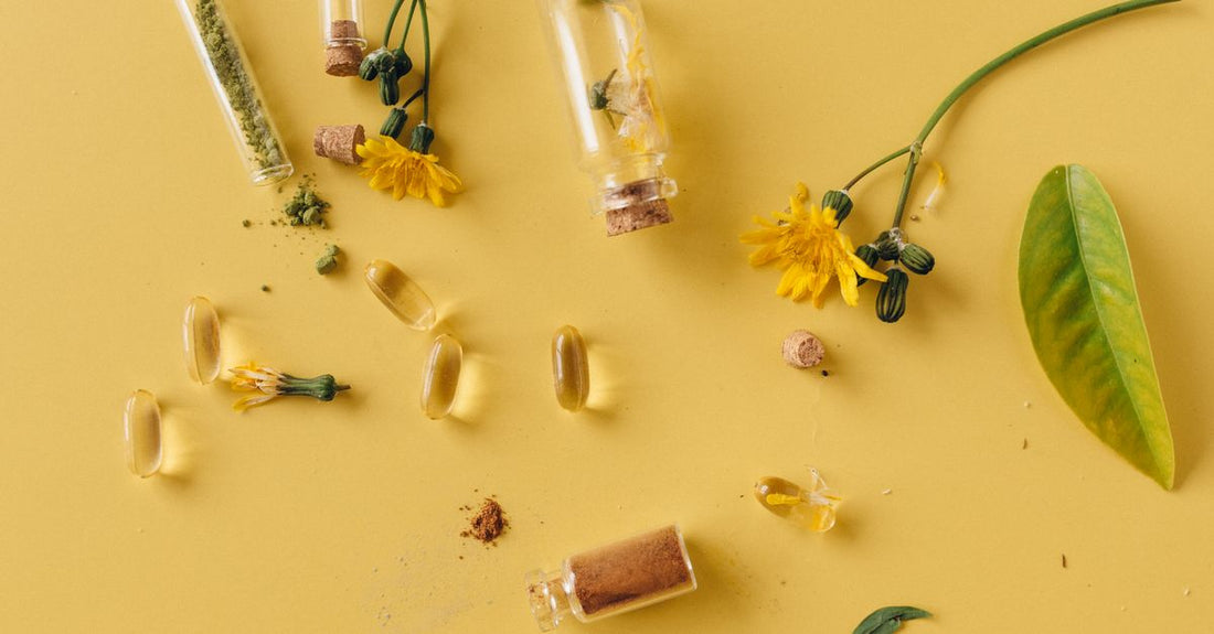 A flatlay of best styling treatments UK 2026 bottles on a white background, showcasing leave-in conditioners, heat protectants, and hair serums for a salon-quality finish.