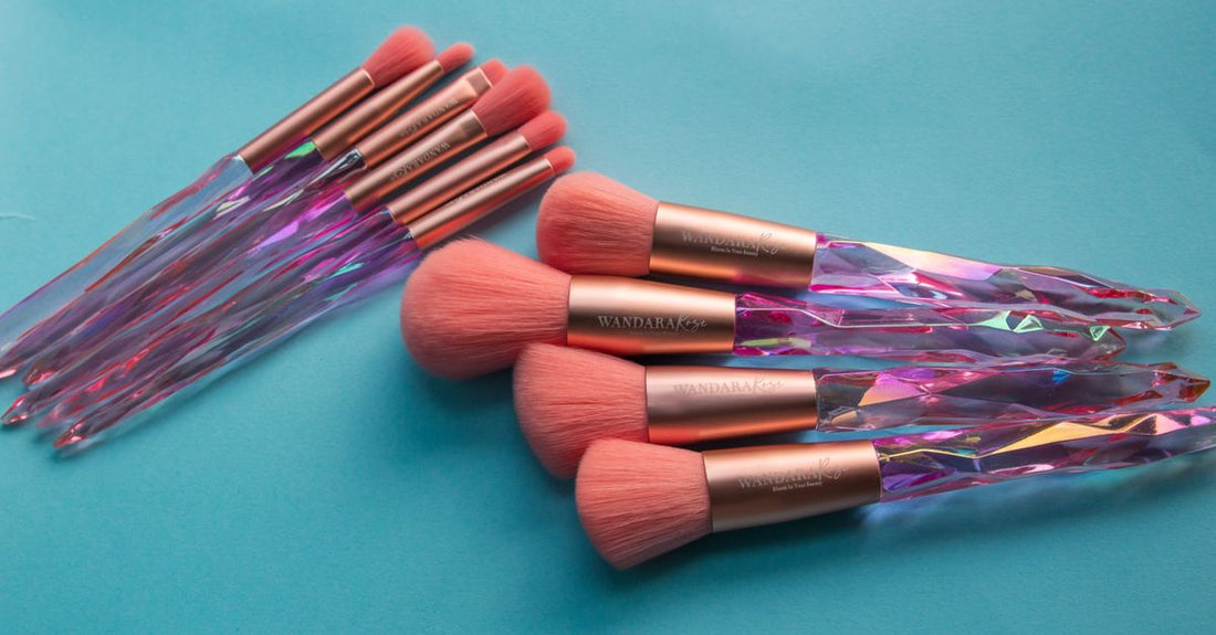 A selection of different concealer brushes displayed on a clean surface, illustrating the concealer brushes buying guide.