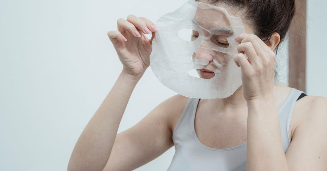A collection of the best masks 2026 including sheet masks, clay mask, and hydrogel mask on a marble surface