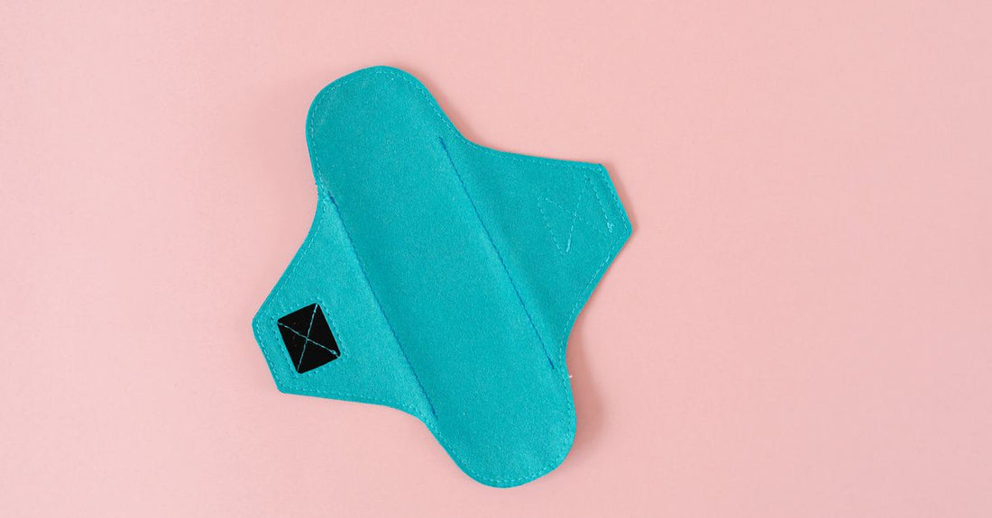 A flatlay of white microfibre face cleansing cloths and disposable towelettes, the best cloths & towelettes 2026 for gentle skincare.