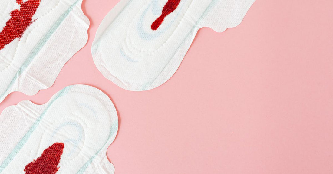 A flatlay of different cotton pads and rounds on a white background, showing textures and thicknesses.
