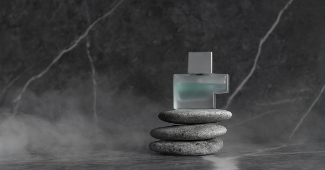 Elegant eau de parfum bottle on a marble surface, illustrating how to choose eau de parfum UK.